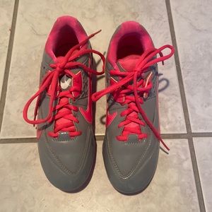 A pair of used Nike Lacrosse speedlax cleats size 7